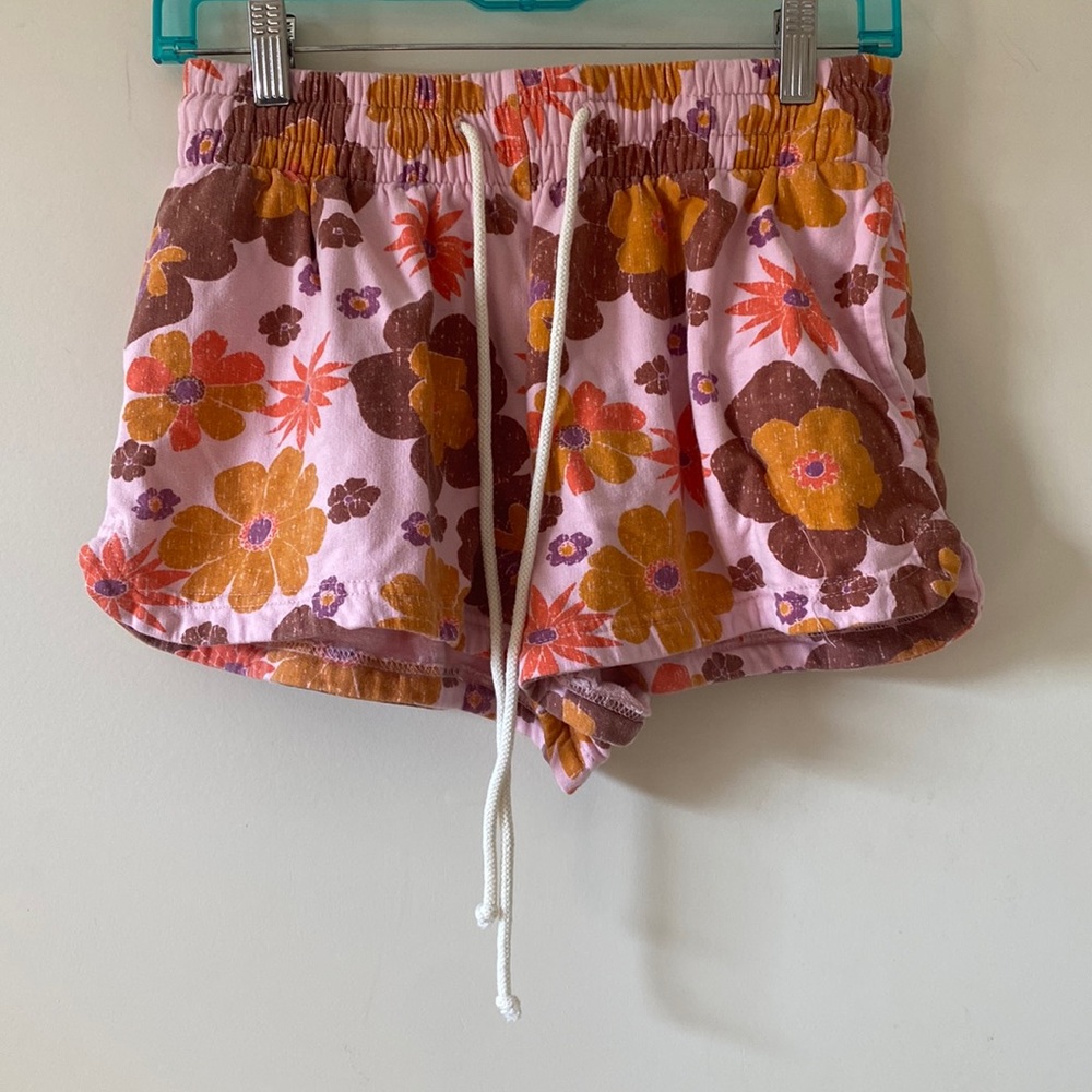 Out from under floral shorts